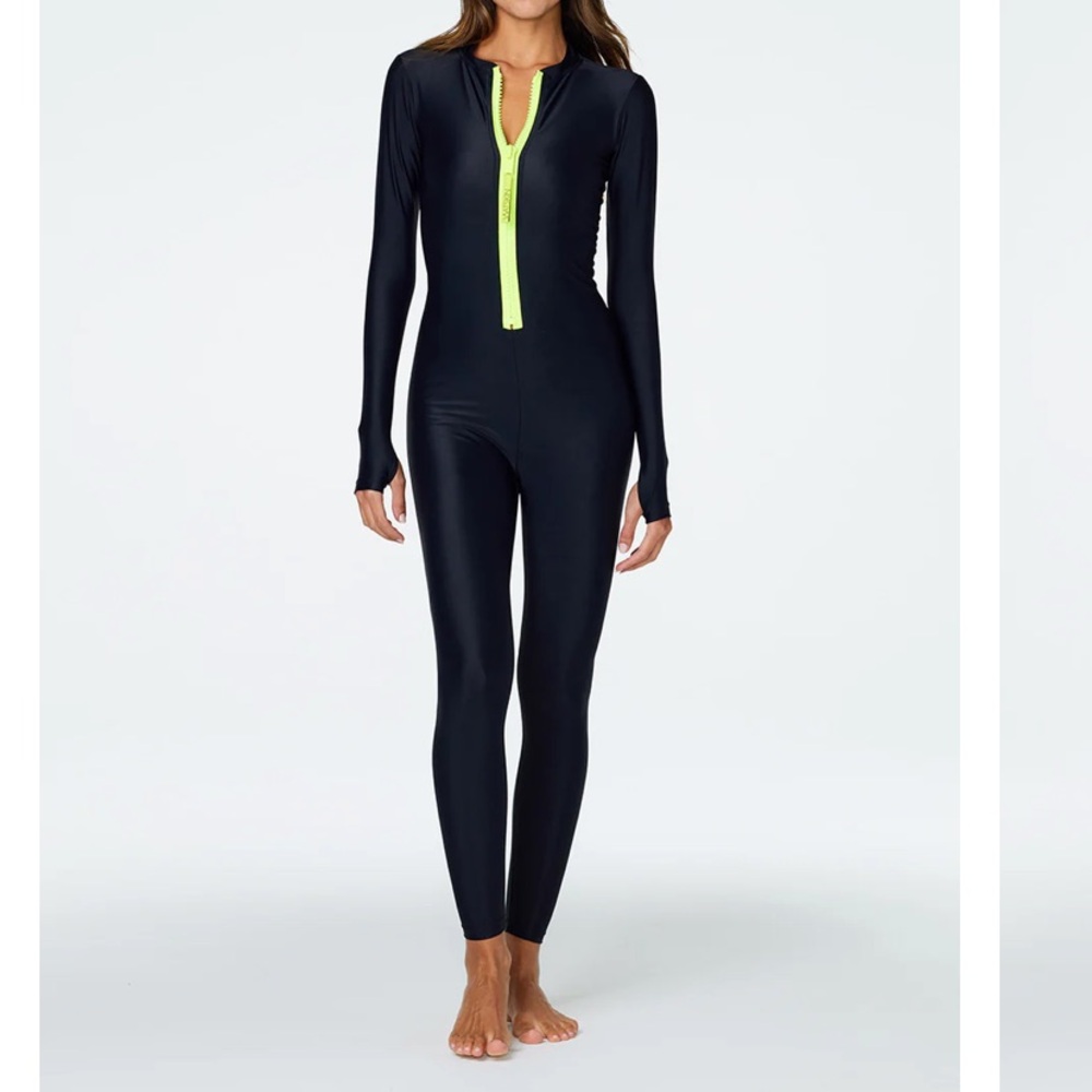 NWOT designer, wetsuit/catsuit long sleeve UPF 50+ UV sun . Brand is Watskin
